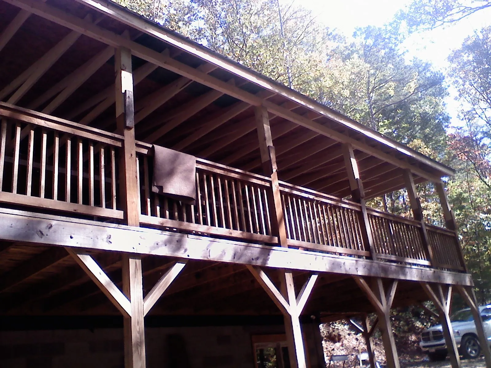 Timber framing under a new elevated porch and deck — Roof Leak Repair in Liscomb by Roofing Brothers